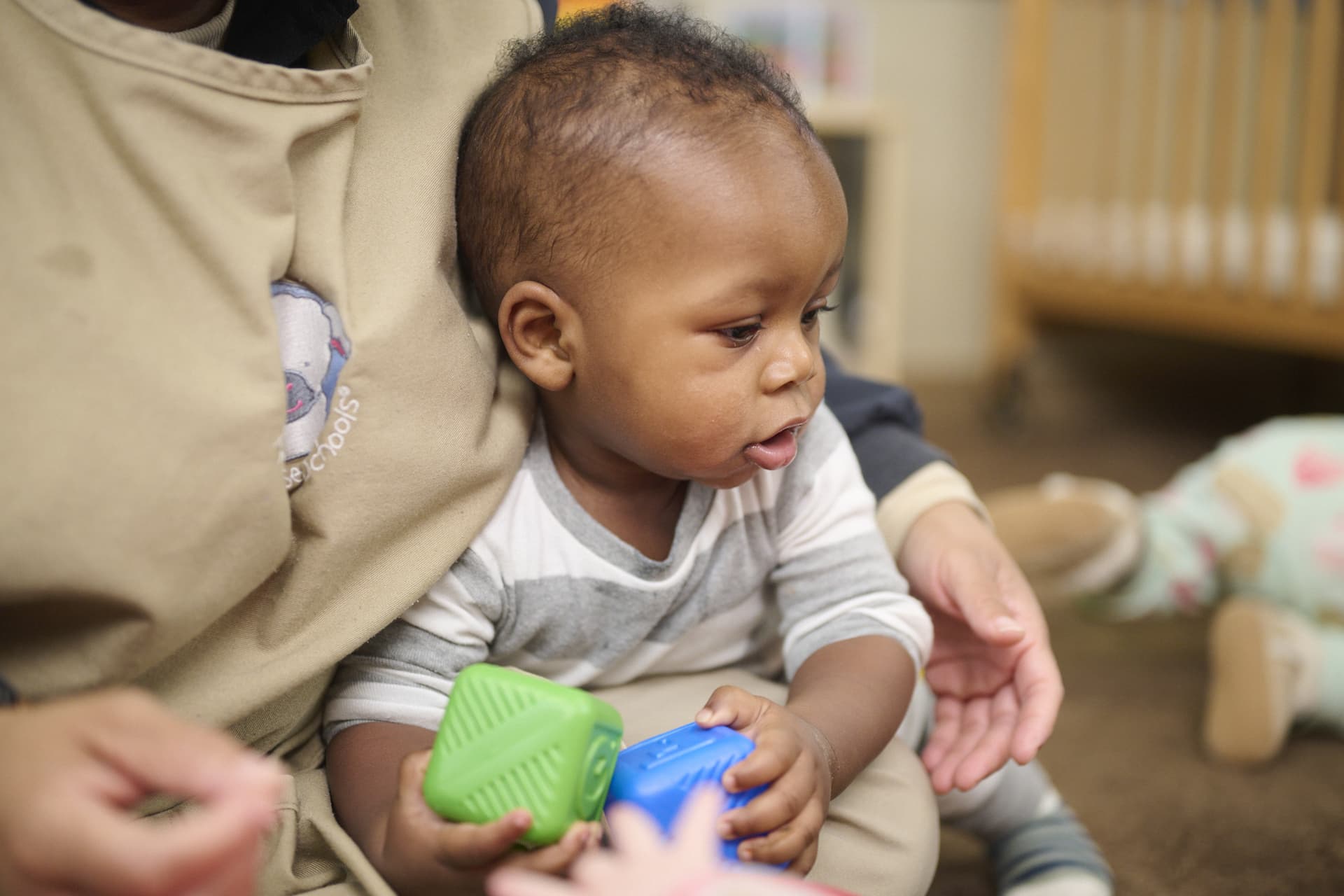 A young boy playing with toys