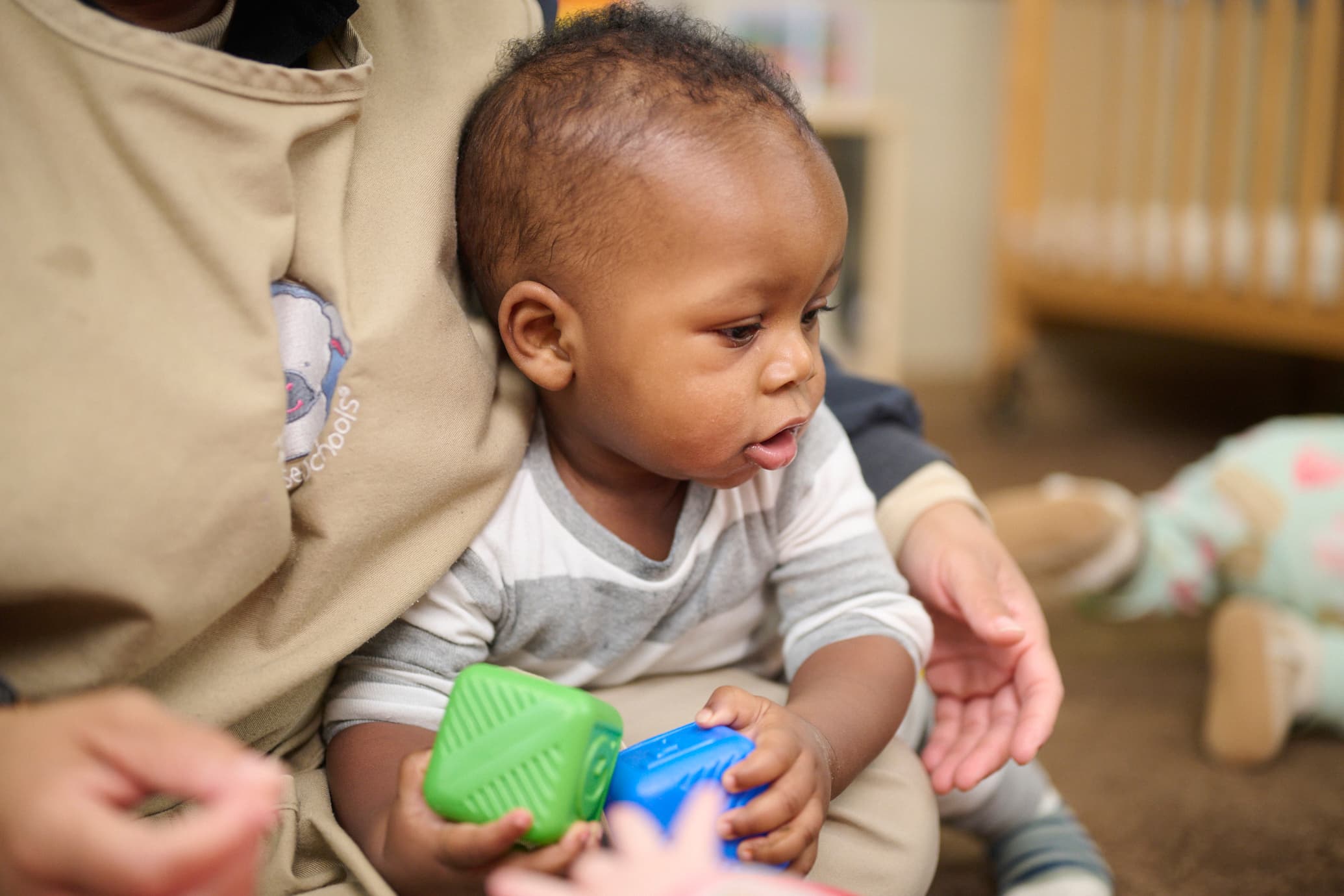 A young boy playing with toys