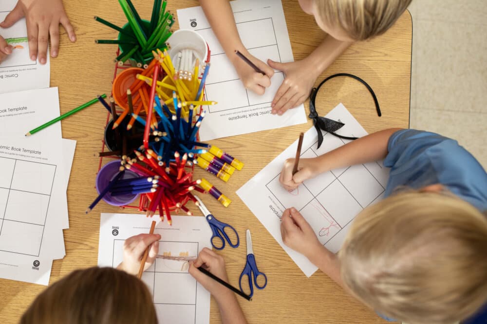 children completing classroom activity